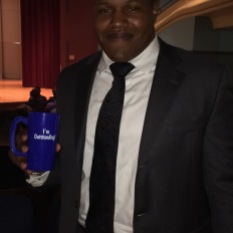 Benjamin Boyd with award, fall 2016 at Drake
